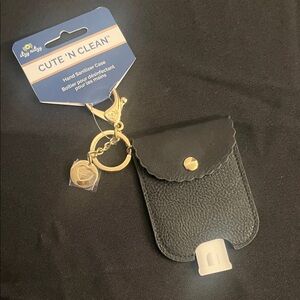 Itzy Ritzy Black Hand Sanitizer Holder with Gold Accents